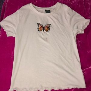 White T-shirt with butterfly decal